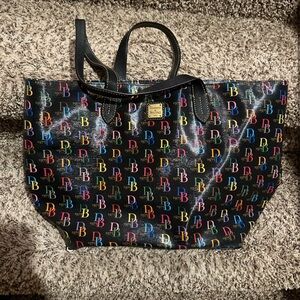 Pre-owned D&B. Some minor damage on piping (see photos), but otherwise nice bag.